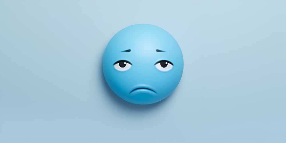 blue pill with a sad face