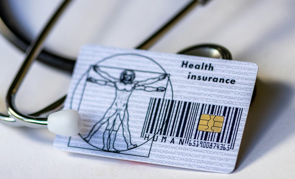 A health insurance card with bar code and microchip